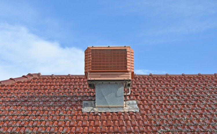 Evaporative air conditioner on tiled roof